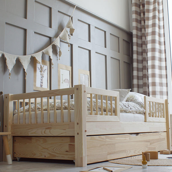 Letto singolo in legno con cassetto, ingresso centrale • Milie