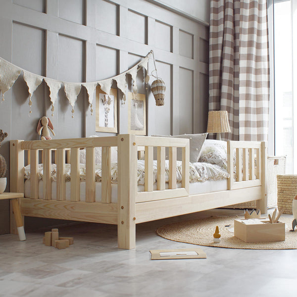 Letto singolo in legno con barriera, ingresso centrale • Nohr